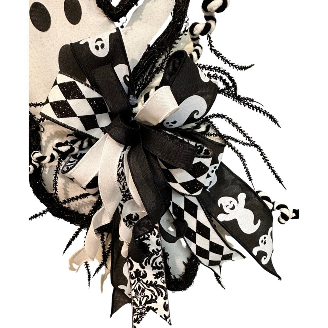 grapevine Halloween white ghost wreath, black and white door décor, haunting beauty and trick-or-treat vibes, screen door wreath